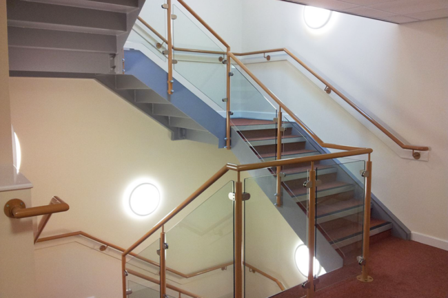 Stainless and Glass Staircase with Wall Mounted Handrails