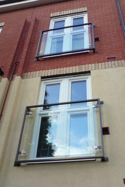 Glass juliet balconies with a steel frame