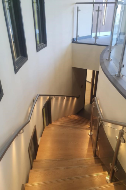 Wooden Floor, Wall Mounted Handrail, Steel and Glass Stair Balustrades
