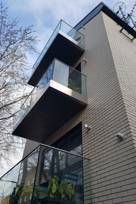 Walkout Balconies with Frameless Glass Balustrades