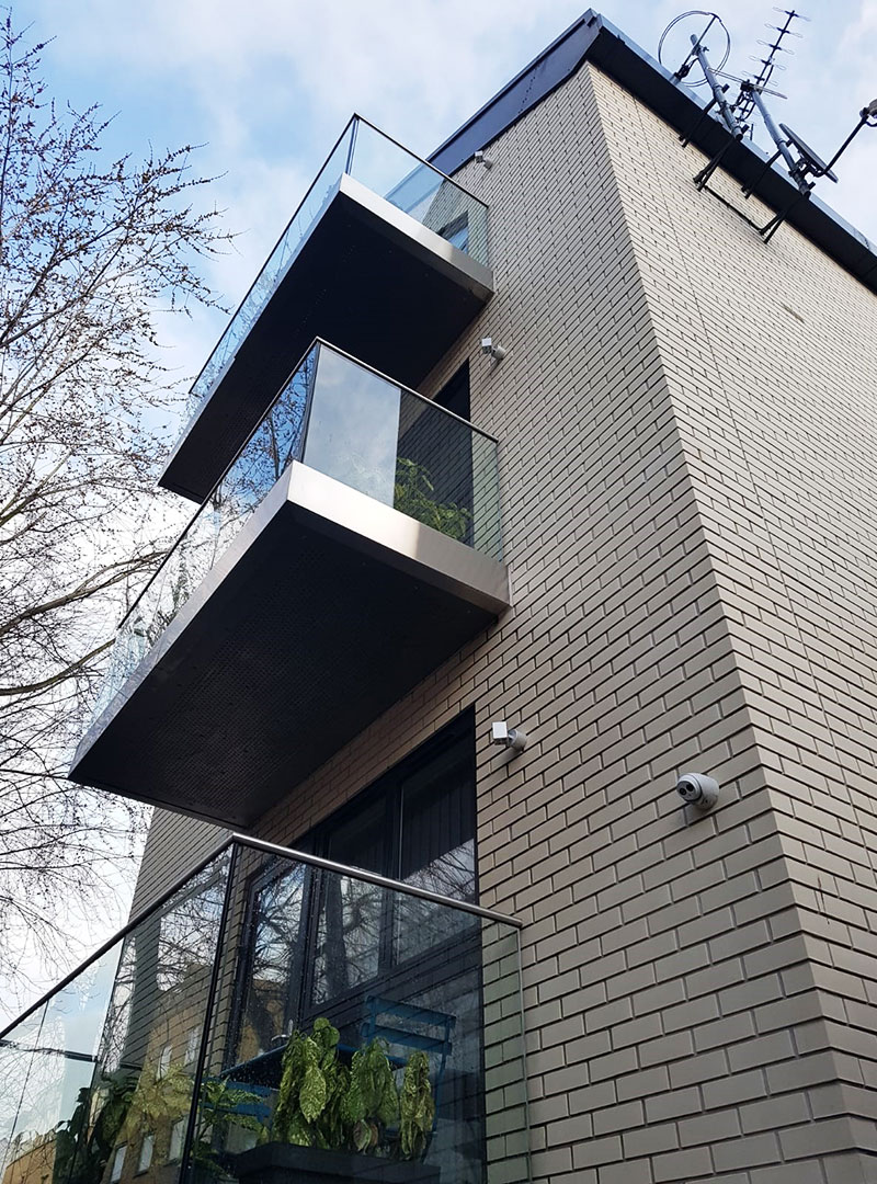 Frameless glass walkout balconies